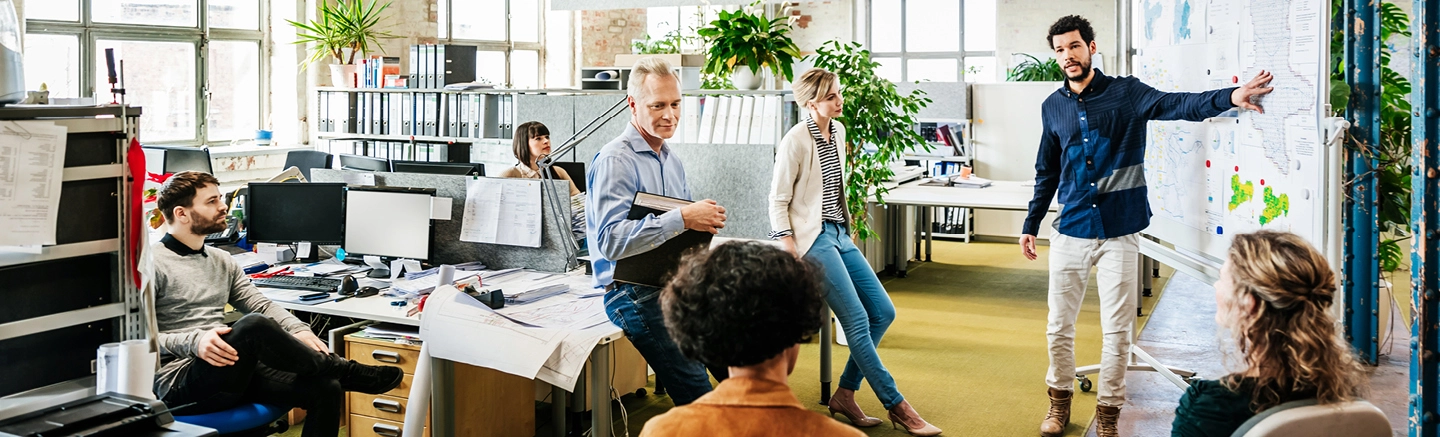 Colleague's in an office having a team meeting